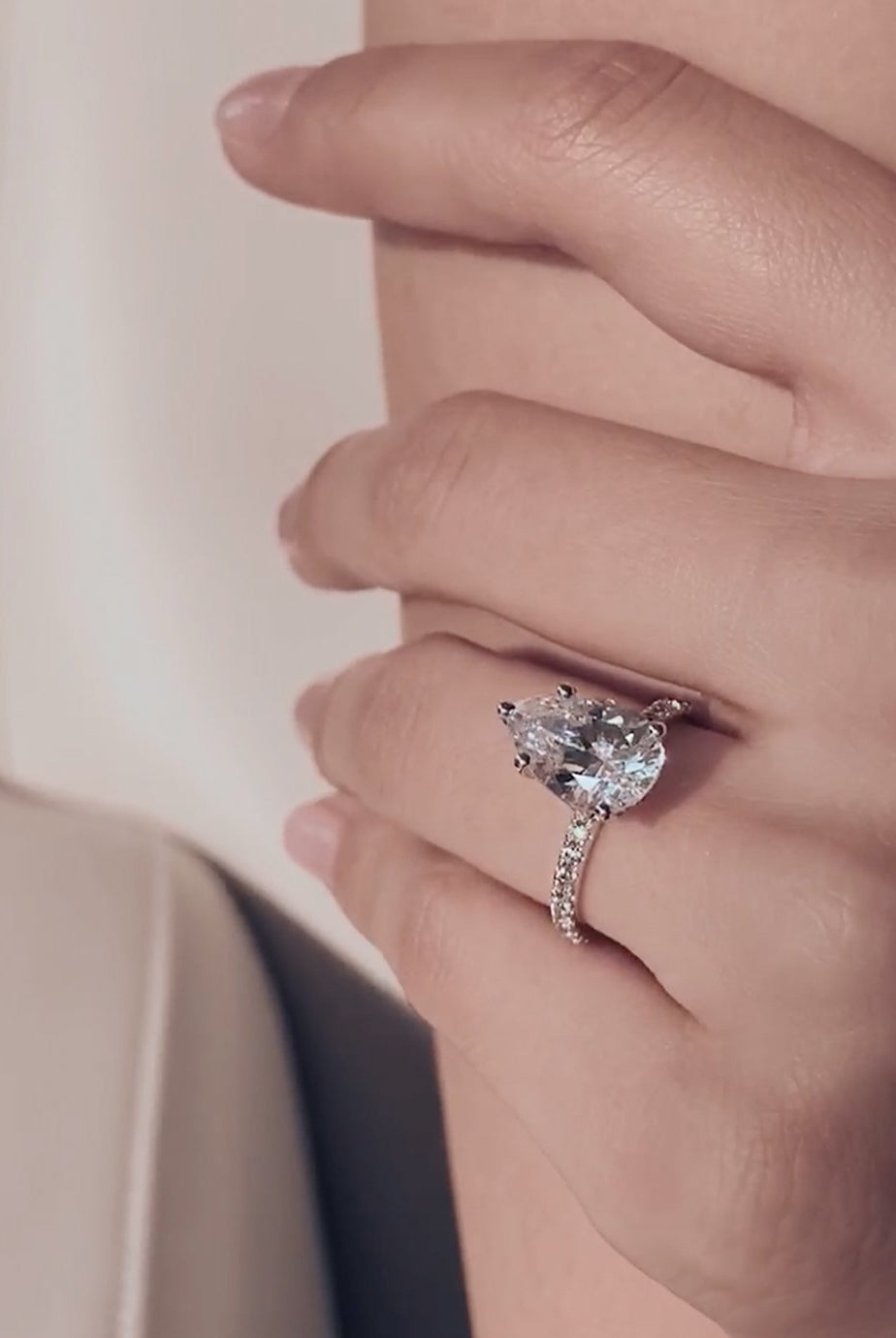 pear-shaped-moissanite-hidden-halo-engagement-ring