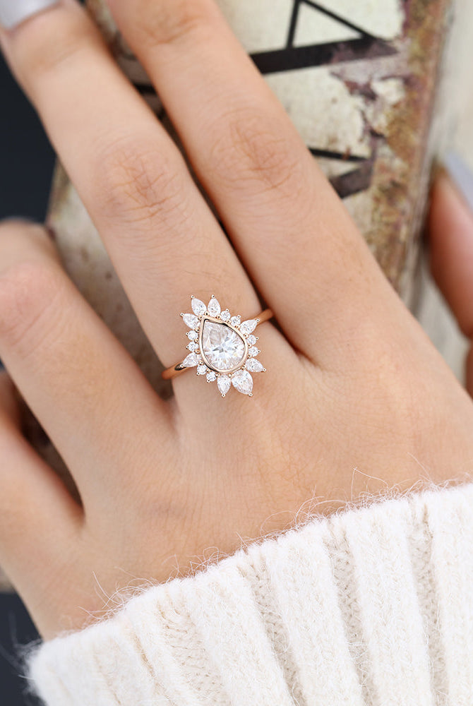 0-57-ct-pear-shaped-moissanite-cluster-halo-engagement-ring