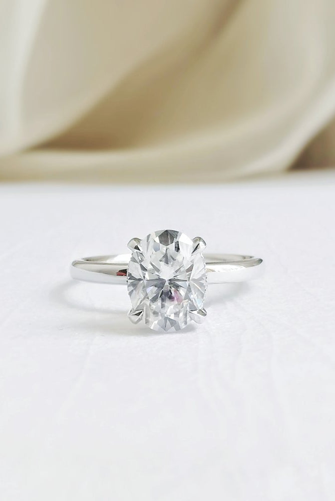 1-50-ct-oval-shaped-moissanite-hidden-halo-engagement-ring