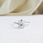 1-50-ct-oval-shaped-moissanite-hidden-halo-engagement-ring