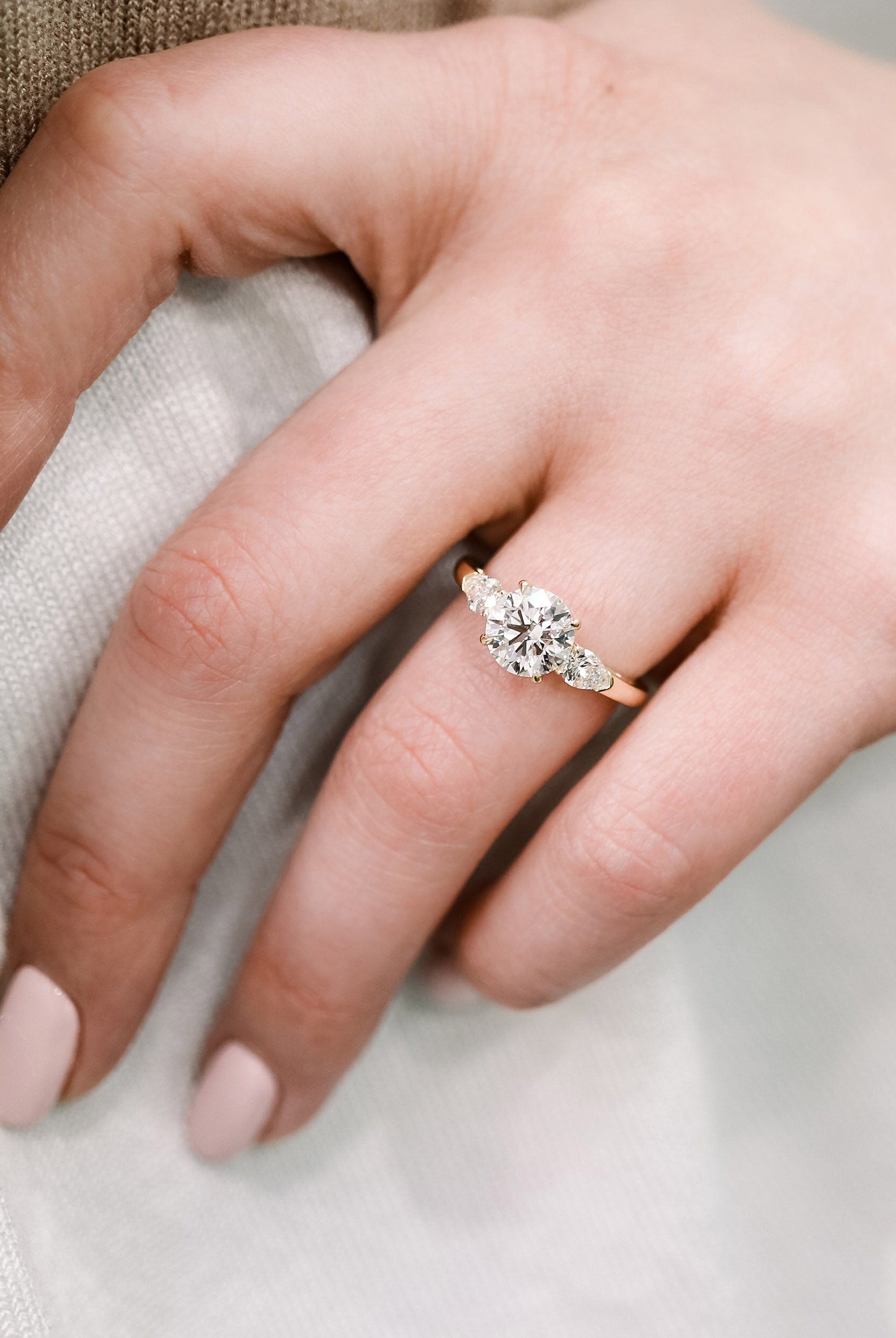 Round and Pear Moissanite Ring