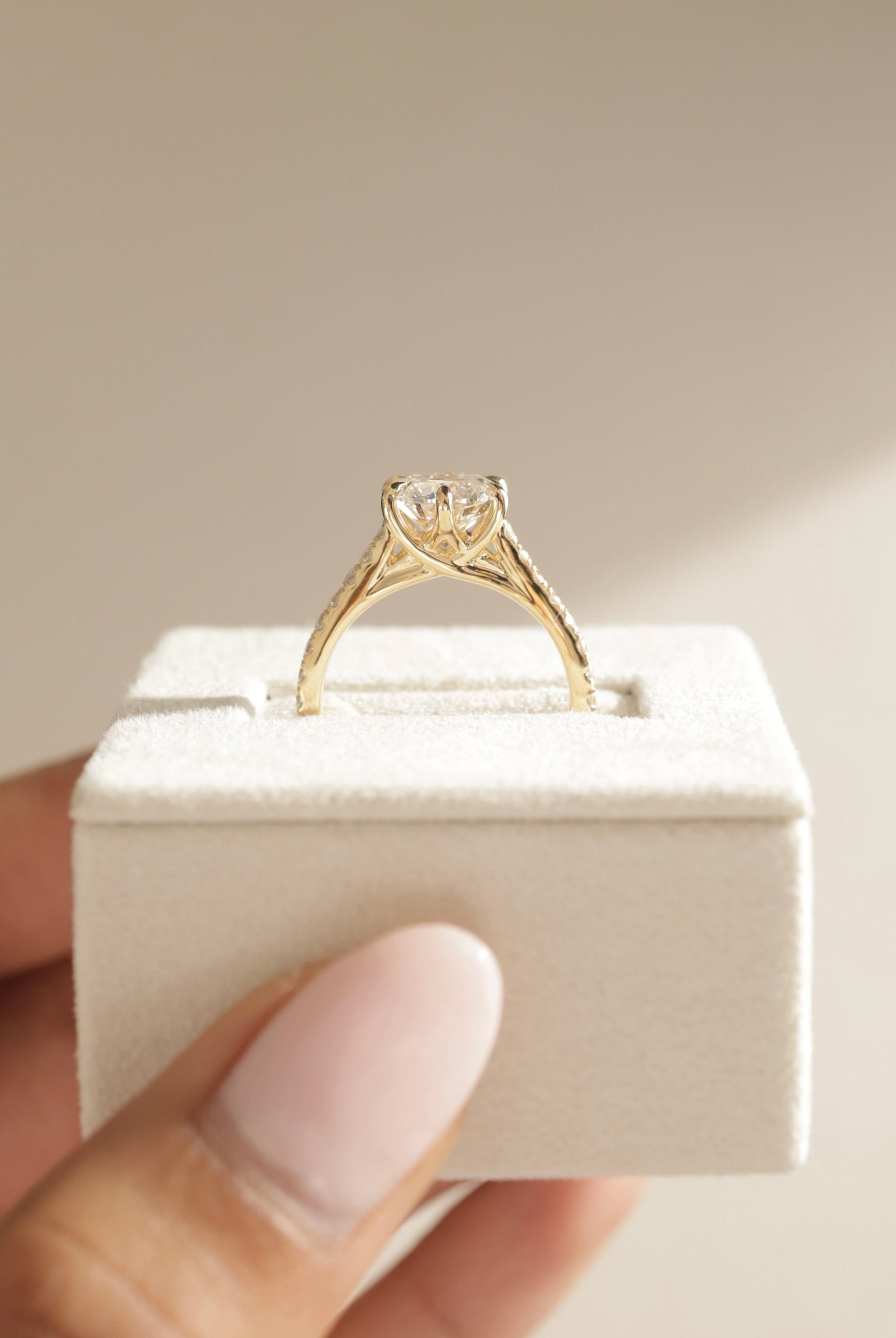 sparkling pave moissanite ring, round solitaire with pave band, brilliant cut moissanite ring, round pave setting ring, moissanite diamond alternative, elegant round moissanite engagement ring, handcrafted pave setting ring, modern round cut ring, round moissanite for her