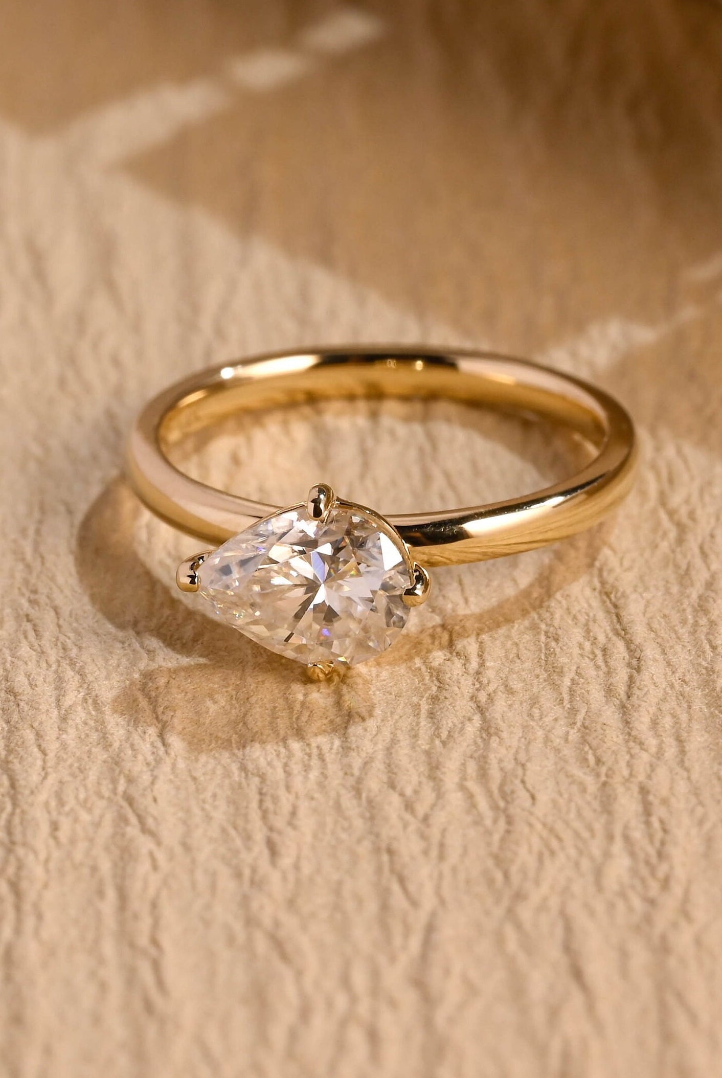 1 carat east west pear moissanite engagement ring
