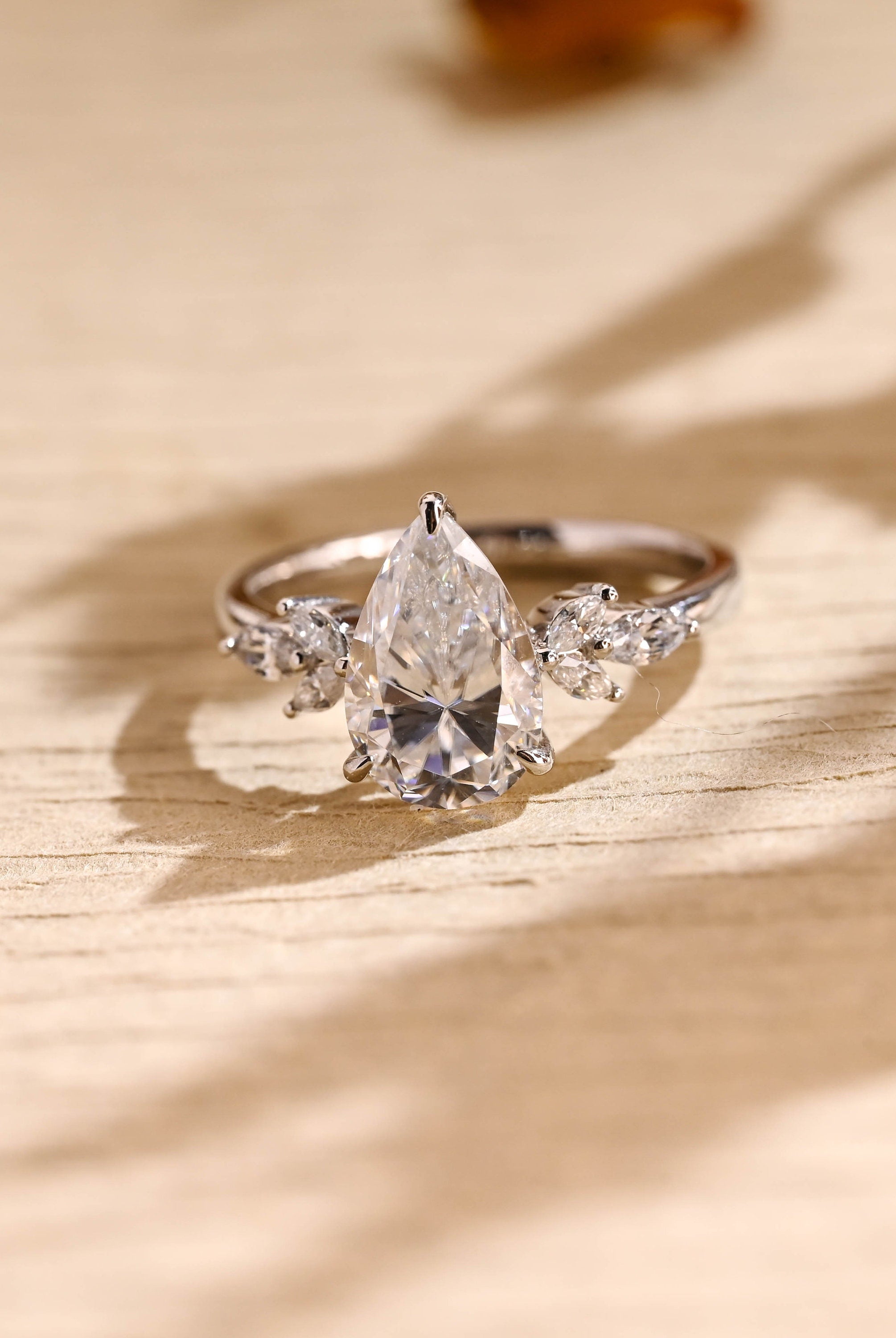 1 carat pear cluster engagement ring moissanite