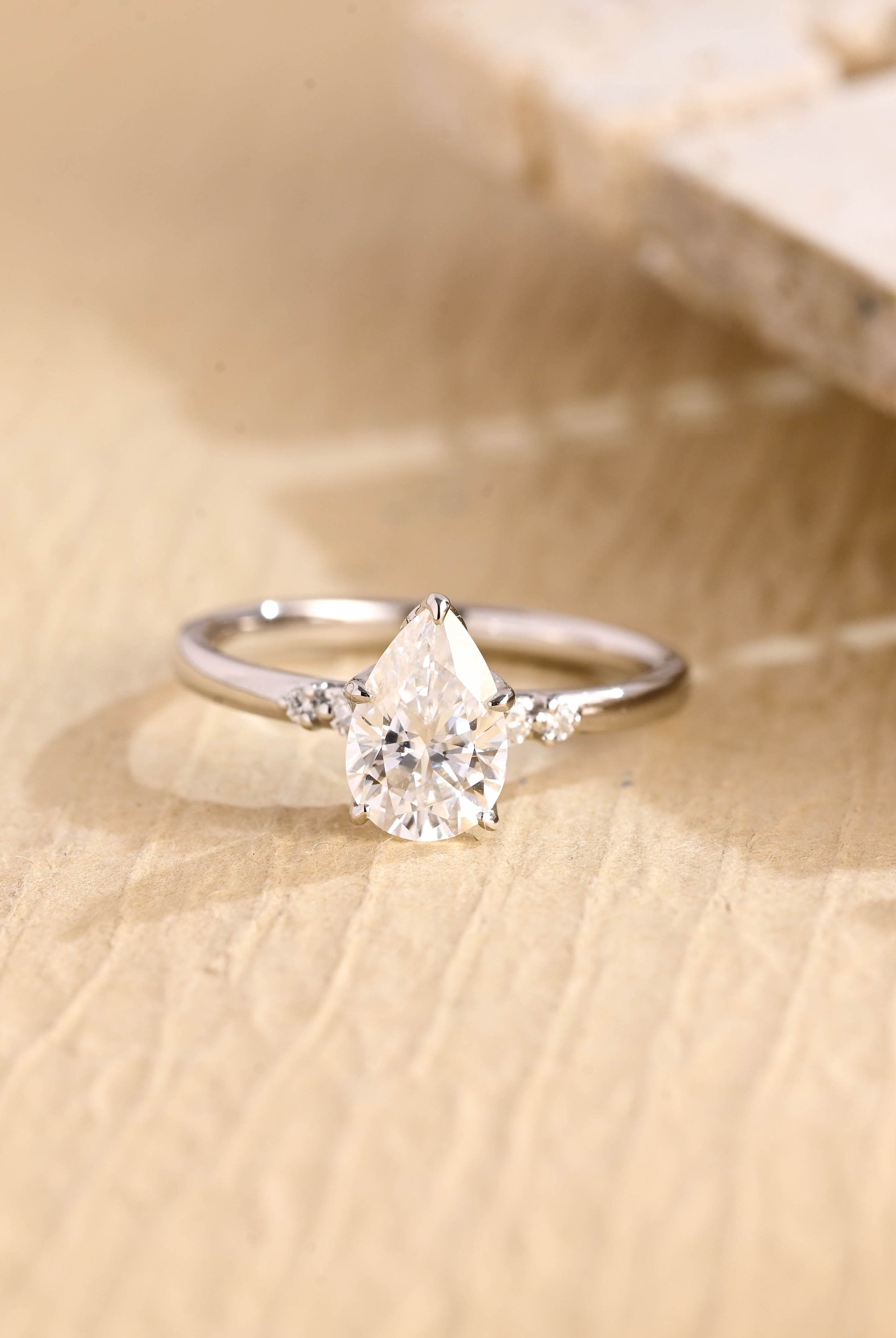 1 carat pear five stone engagement ring moissanite