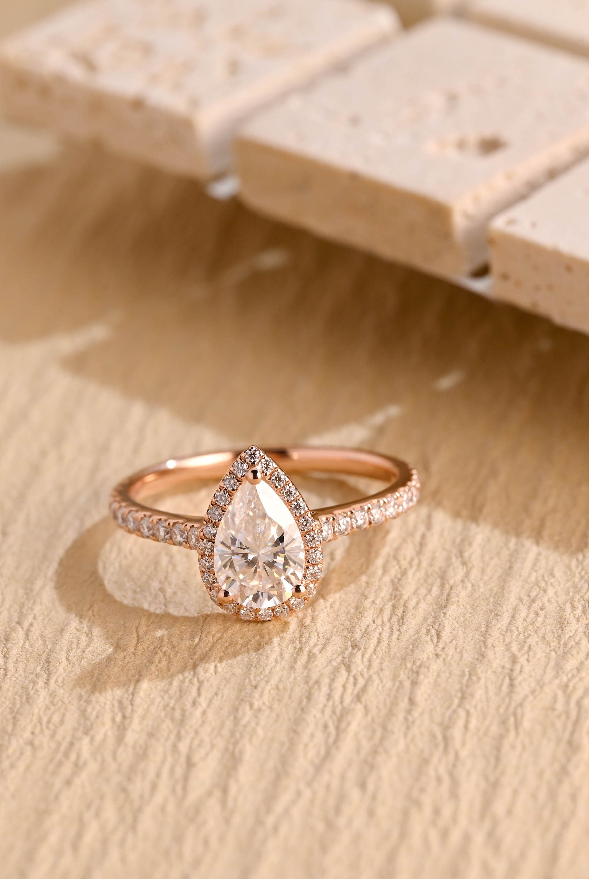 1 carat pear halo moissanite engagement ring