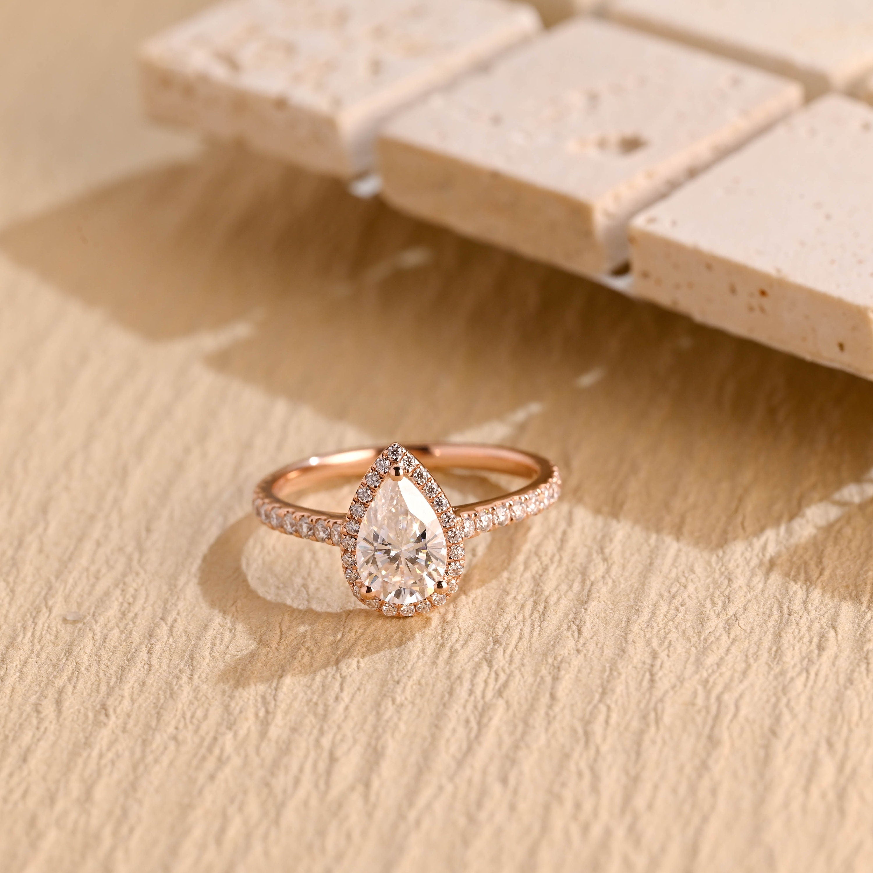 1 carat pear halo moissanite engagement ring