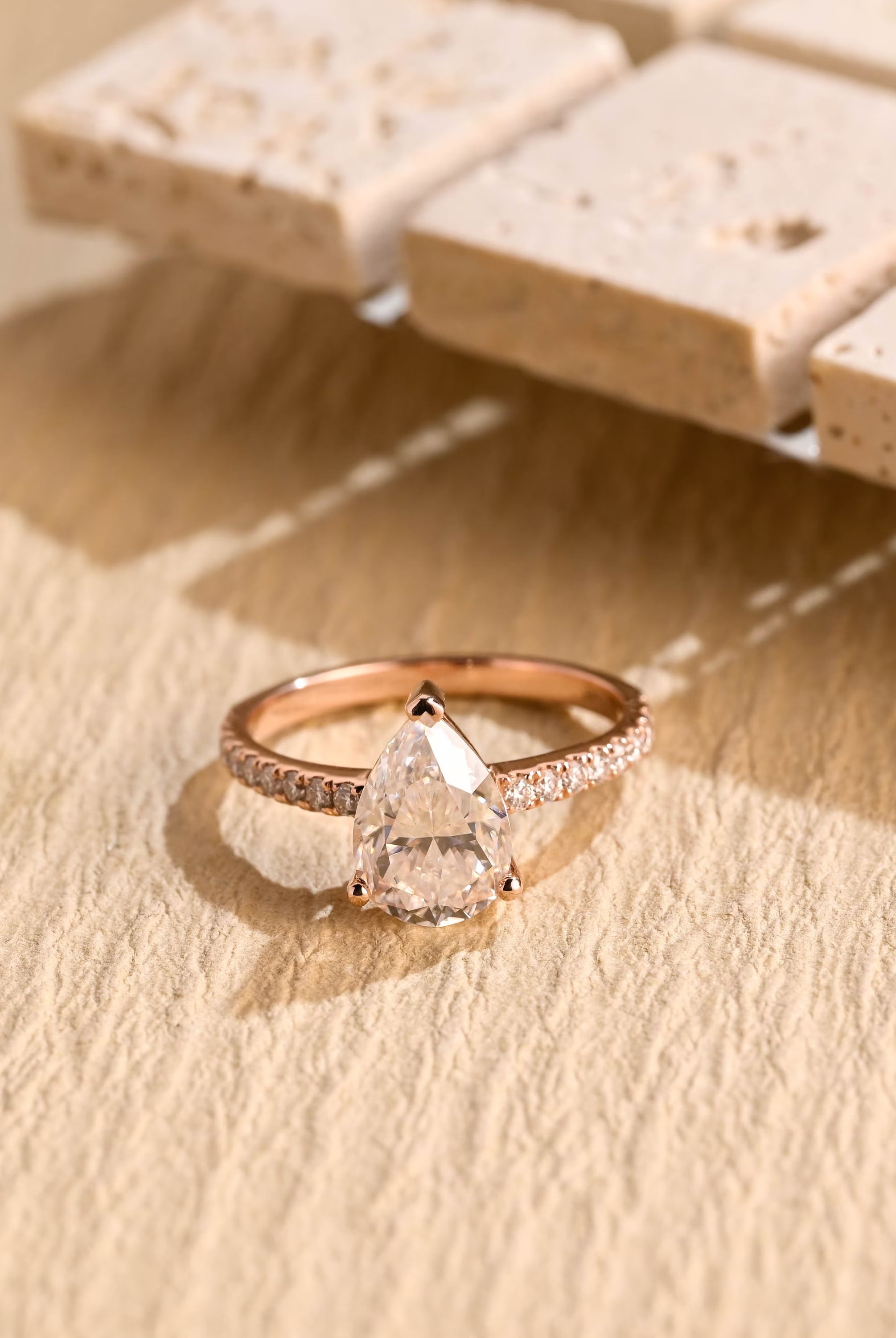 1 carat pear moissanite engagement ring pavé
