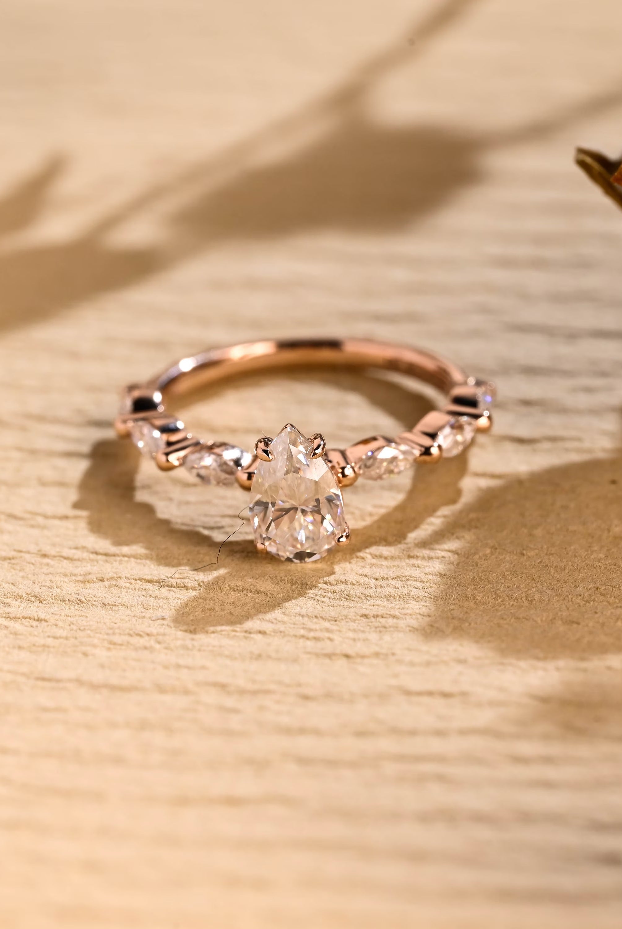 1 carat pear pavé engagement ring moissanite