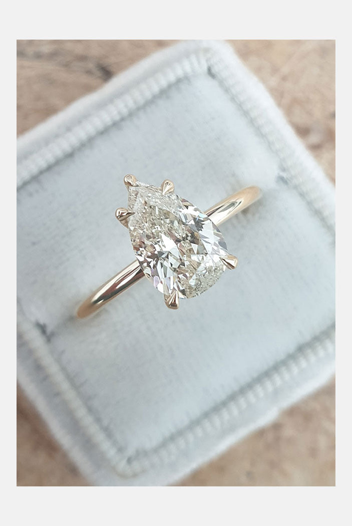 Pear Cut Moissanite Solitaire Engagement Ring
