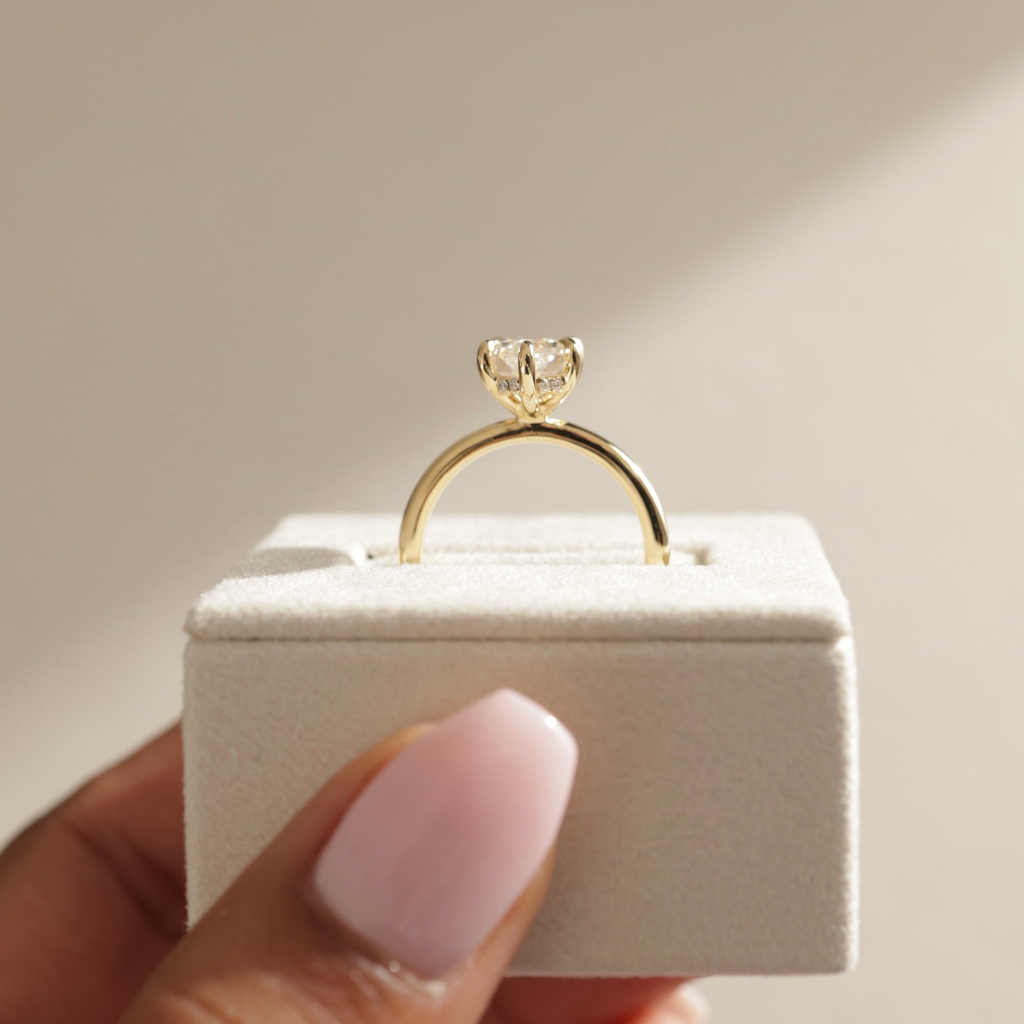 hidden halo engagement ring, hidden halo diamond ring, gold hidden halo ring, white gold hidden halo setting, rose gold hidden halo ring, kite diamond ring, kite cut diamond engagement rings