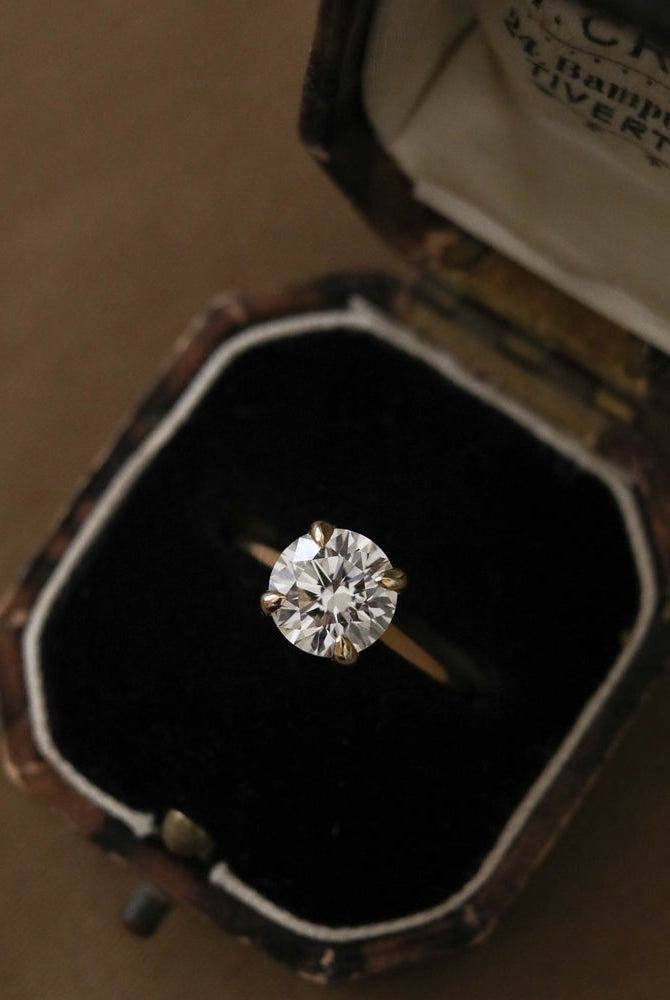 Round Moissanite Engagement Ring