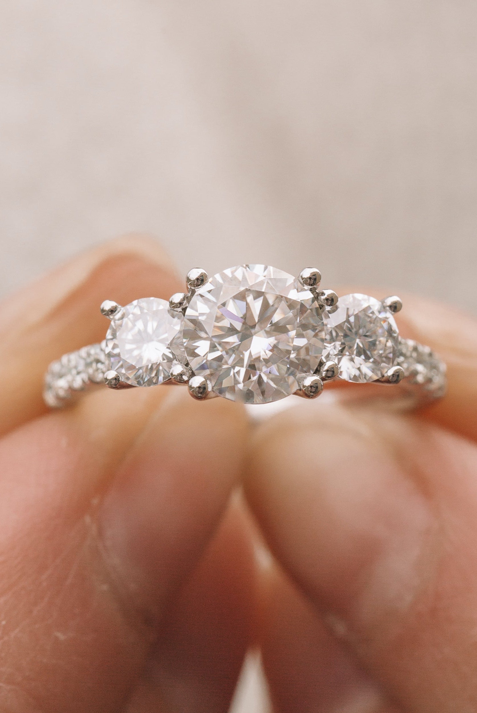Round Three Stone Moissanite Ring
