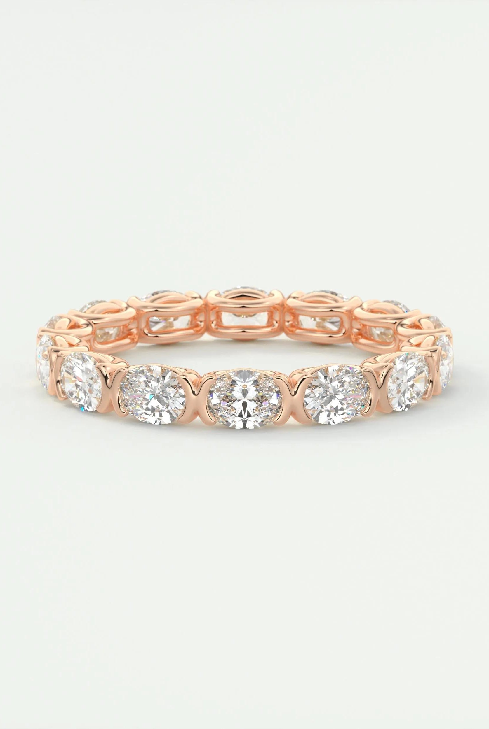 oval-cut-half-bezel-moissanite-bridal-wedding-band