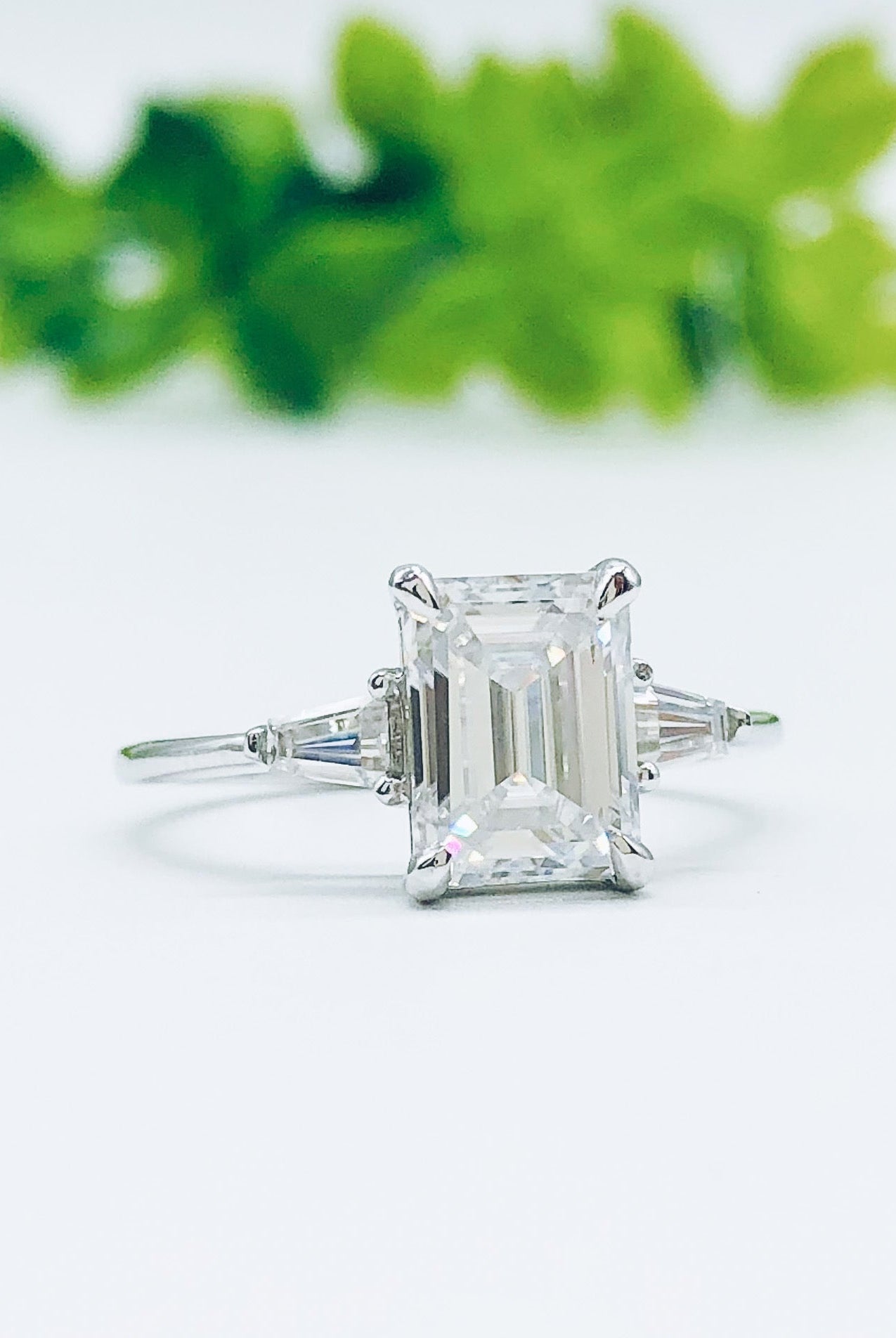 1-9-ct-emerald-cut-three-stone-moissanite-engagement-ring