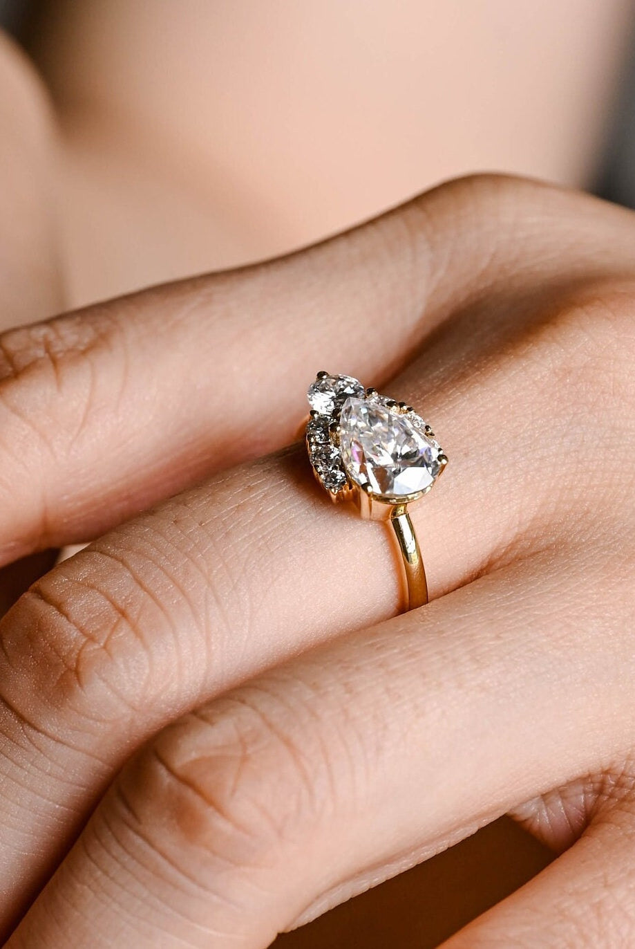 affordable luxury pear moissanite ring