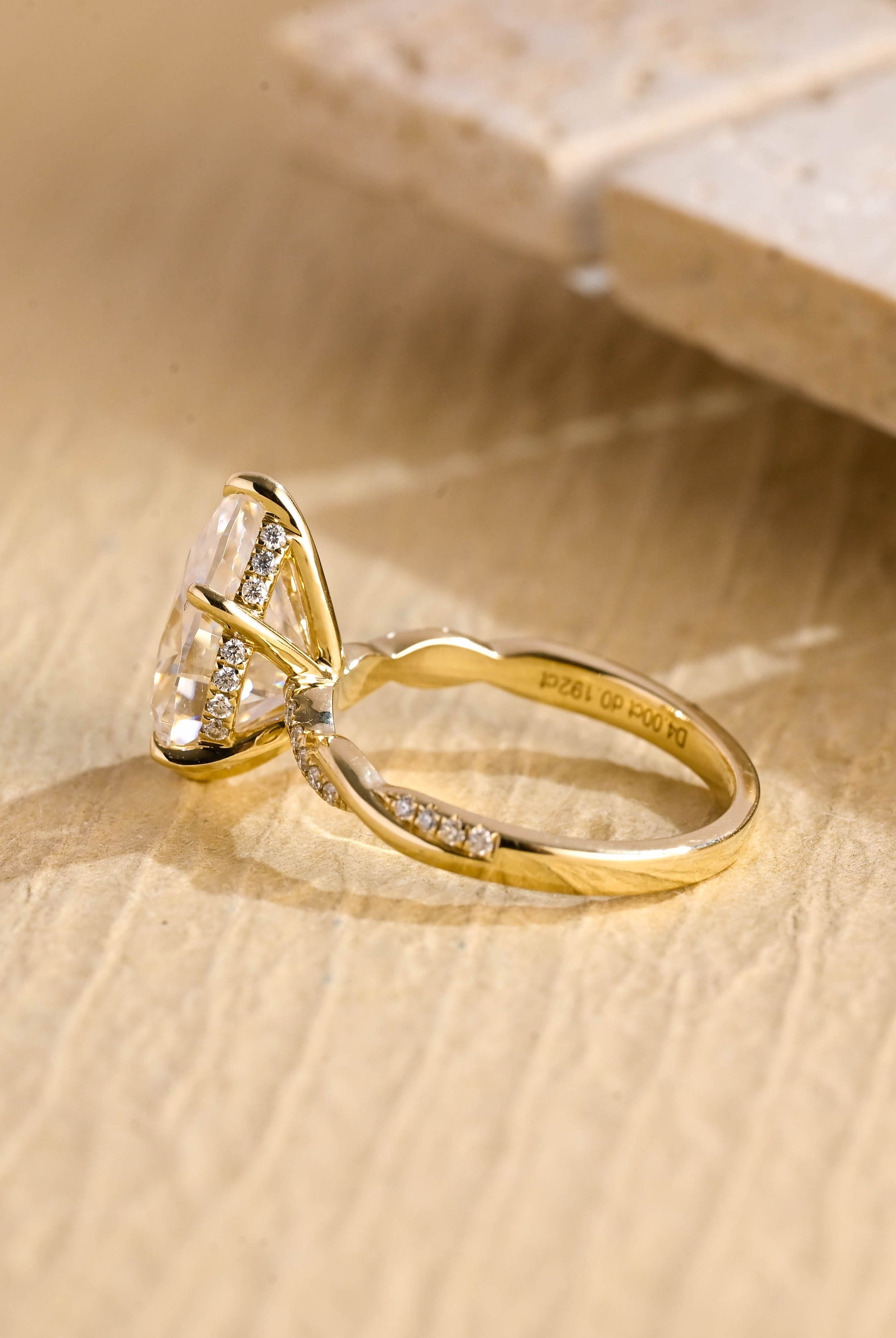 hidden halo pear moissanite engagement ring USA