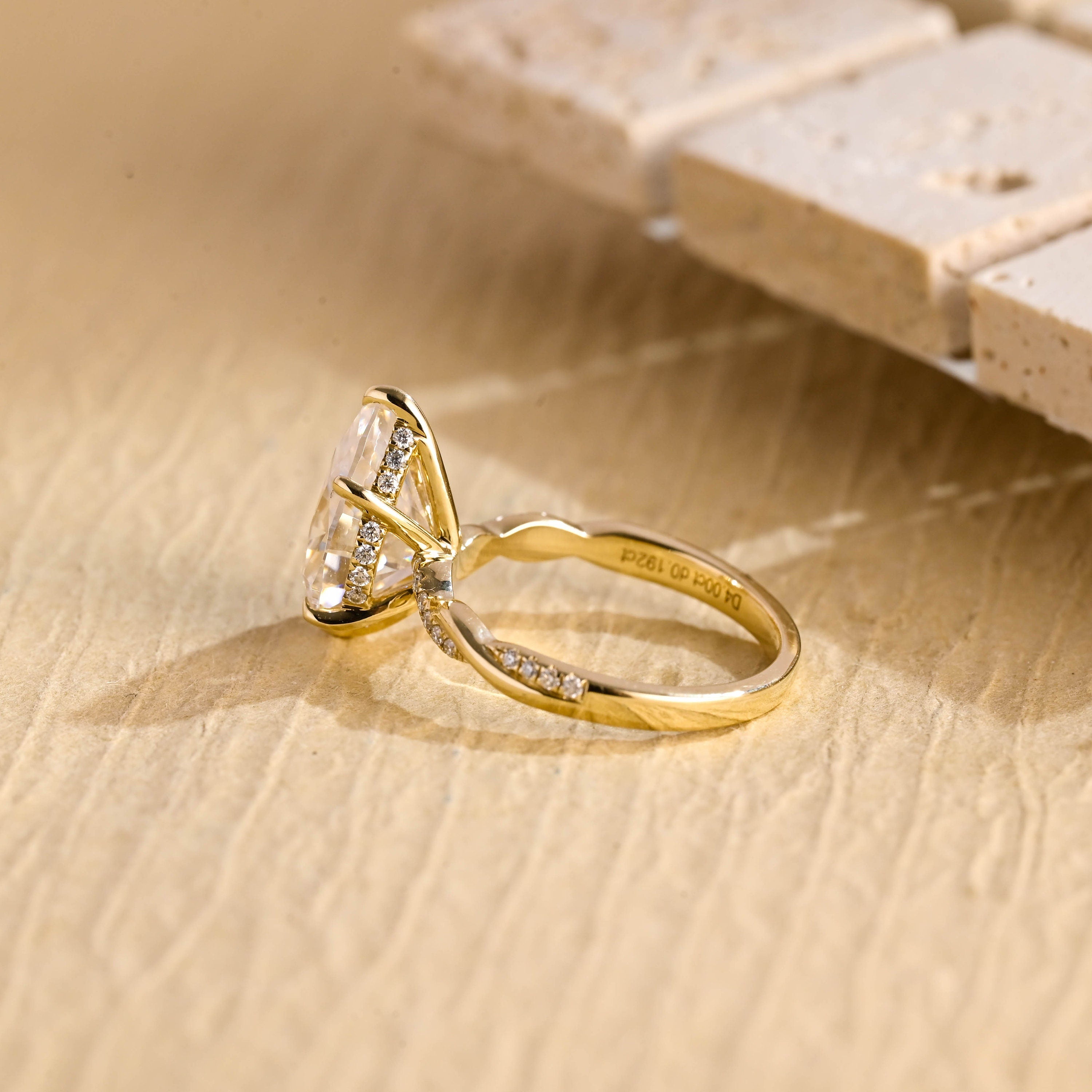 hidden halo pear moissanite engagement ring USA