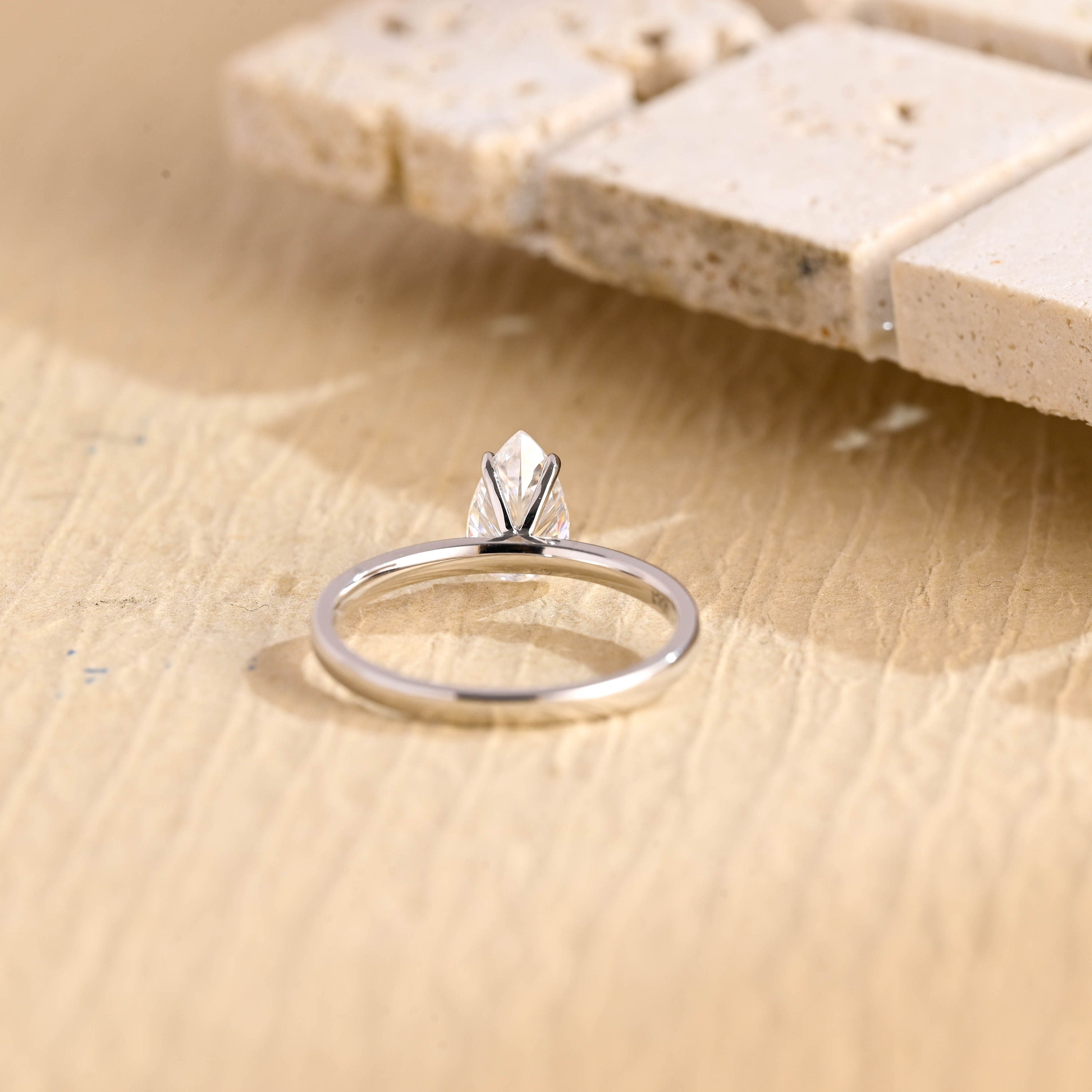 lab grown pear solitaire engagement ring
