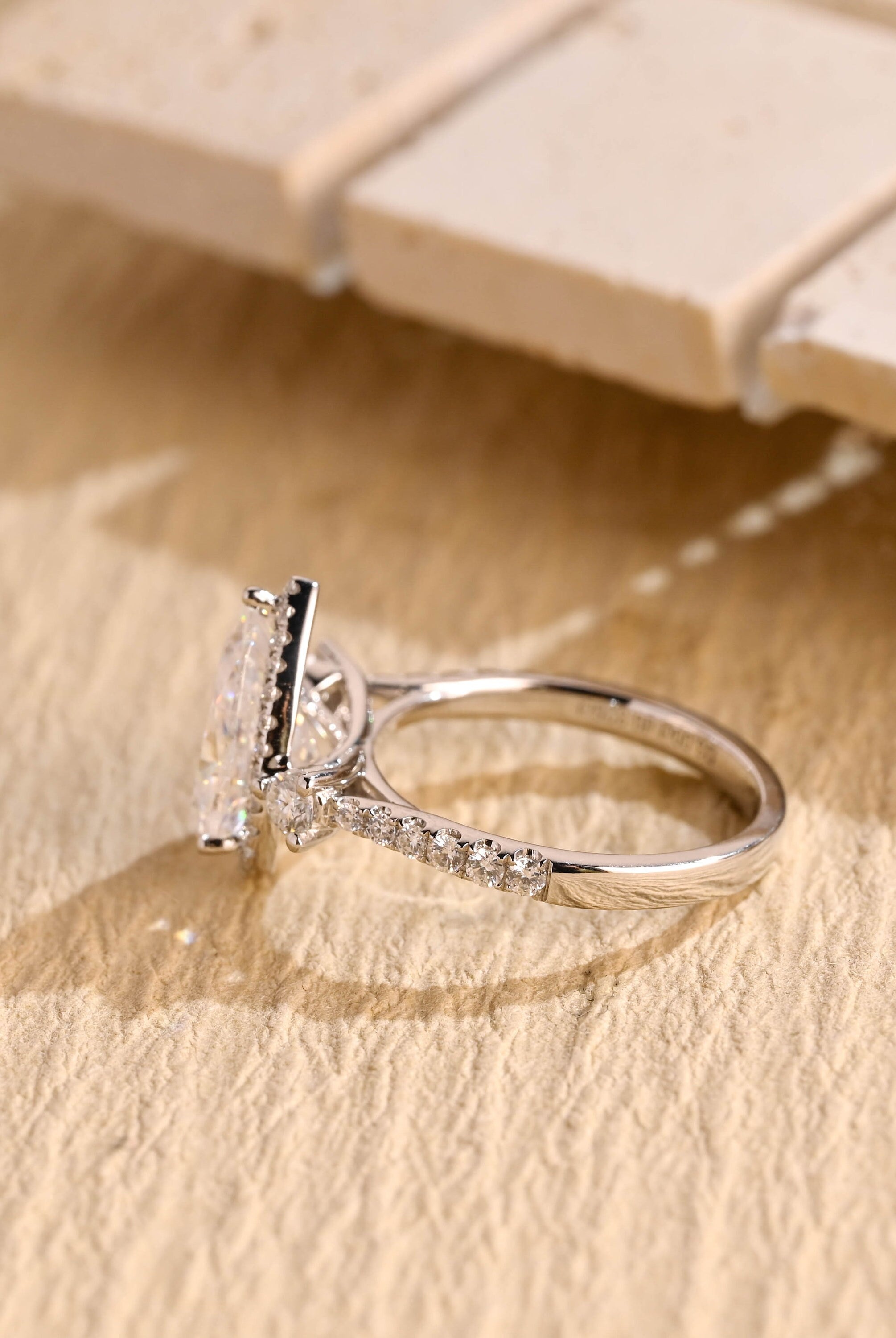 pear cut three stone moissanite ring USA