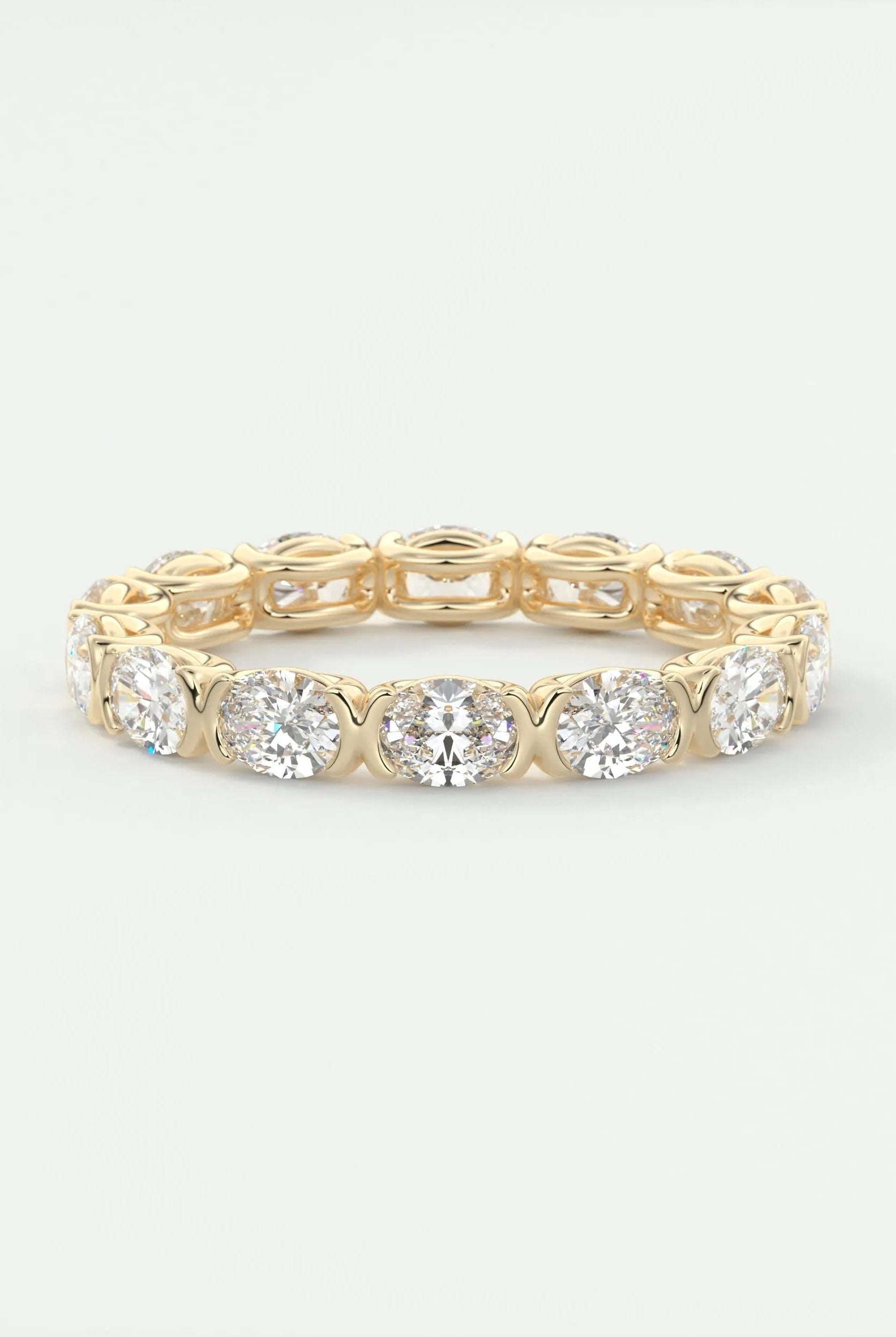 2-25-oval-cut-half-bezel-moissanite-bridal-wedding-band