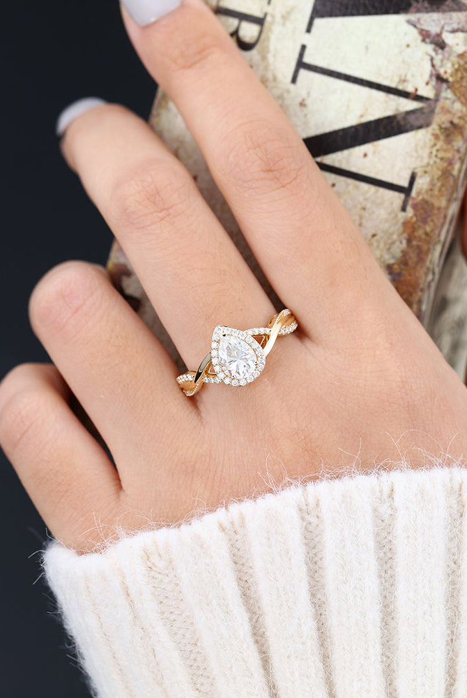 0-43-ct-pear-shaped-moissanite-halo-twisted-pave-engagement-ring