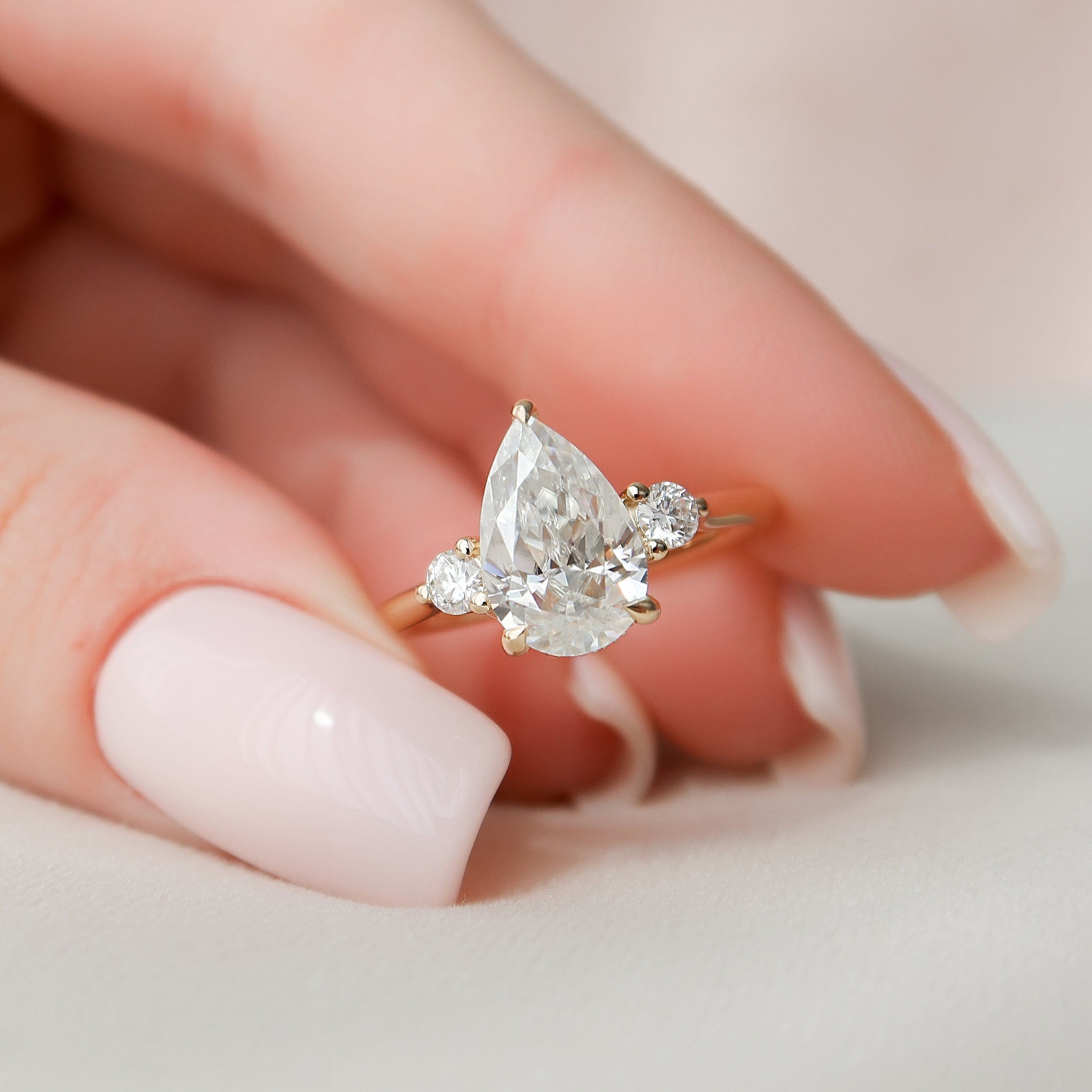 Pear Hidden Halo Moissanite Ring