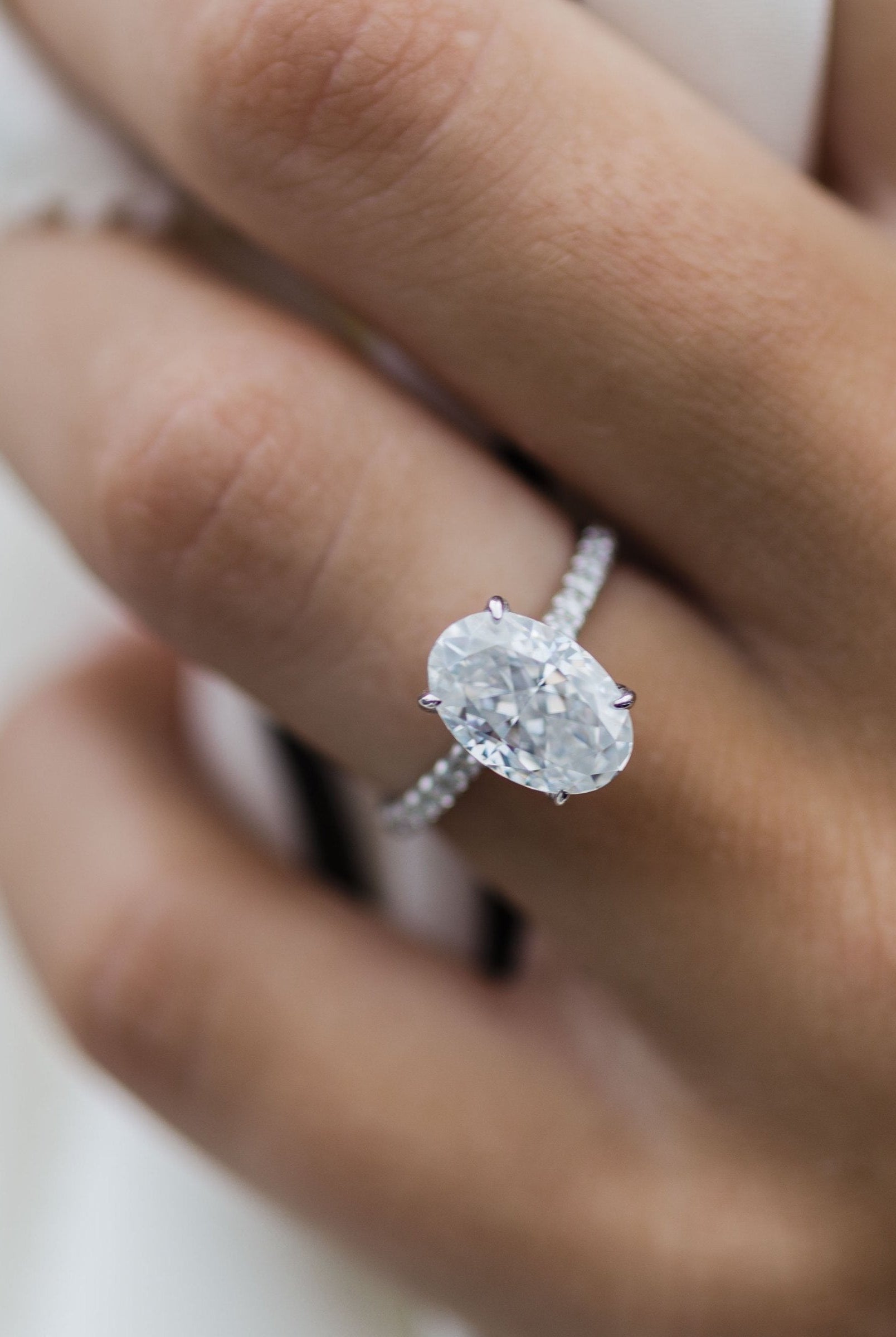 Oval Hidden Halo Moissanite Ring
