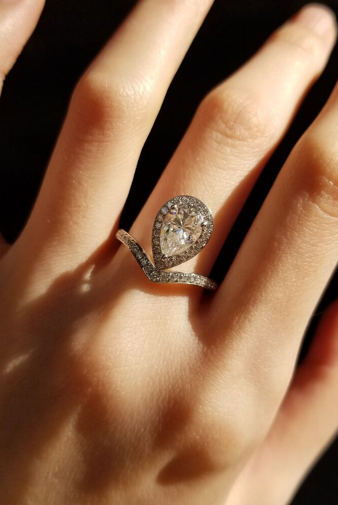 1-50-ct-pear-shaped-moissanite-halo-engagement-ring