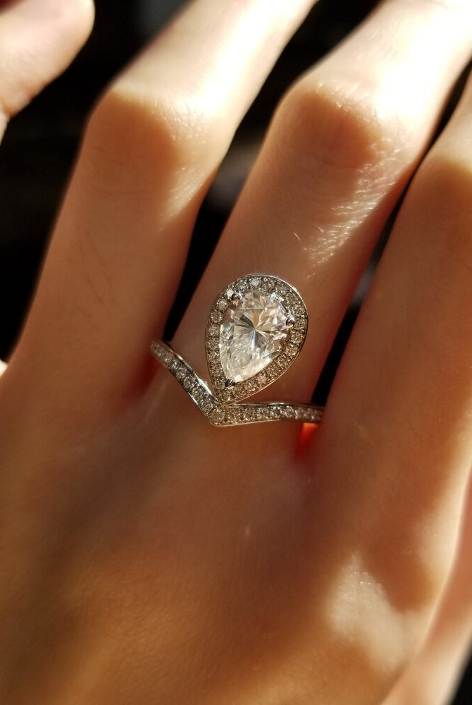 1-50-ct-pear-shaped-moissanite-halo-engagement-ring