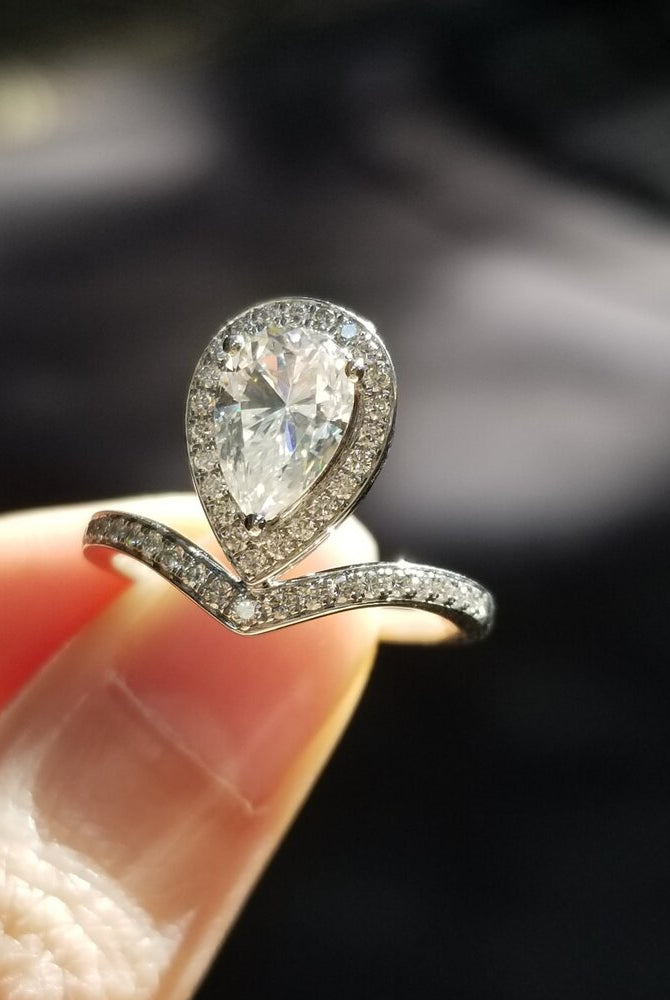 1-50-ct-pear-shaped-moissanite-halo-engagement-ring