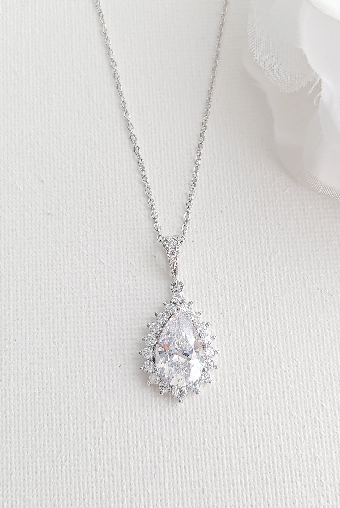 1-0-ct-pear-moissanite-halo-drop-necklace-for-women