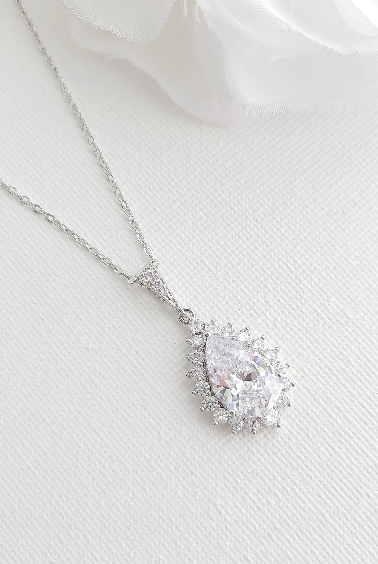 1-0-ct-pear-moissanite-halo-drop-necklace-for-women