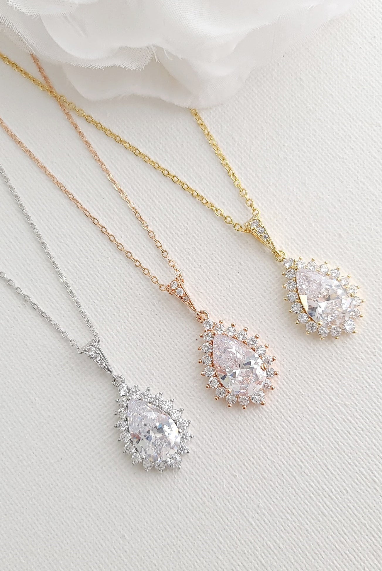 1-0-ct-pear-moissanite-halo-drop-necklace-for-women
