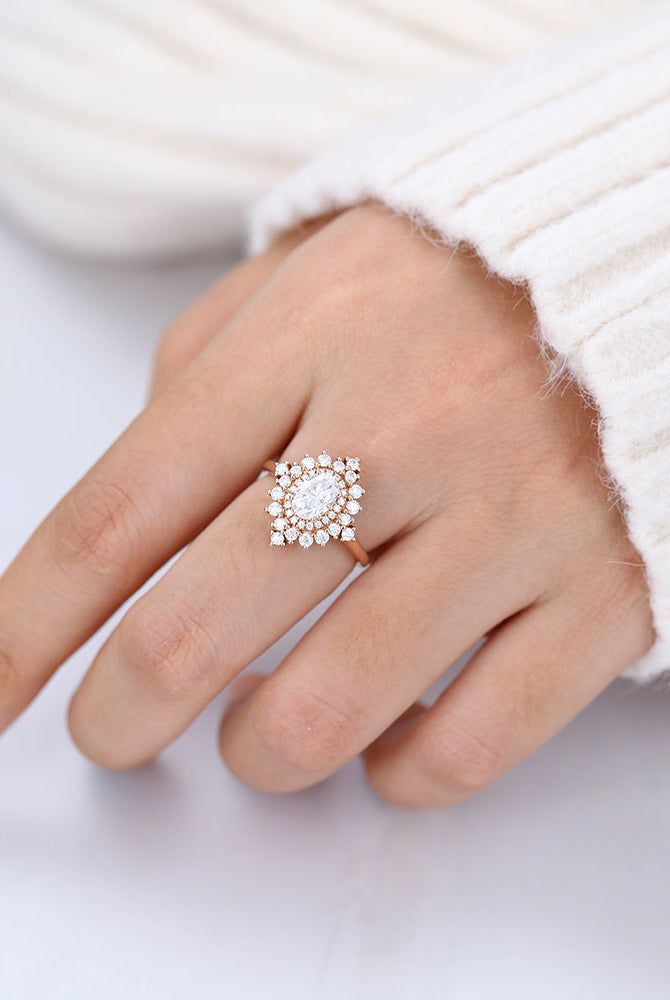 oval-shaped-moissanite-cluster-halo-engagement-ring
