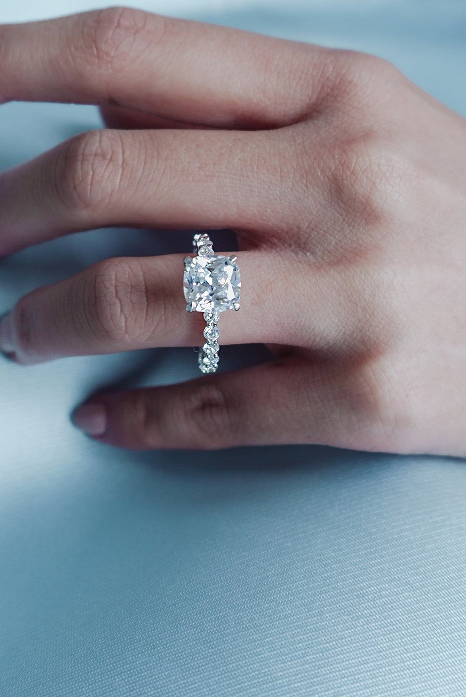 cushion-shaped-moissanite-hidden-halo-engagement-ring