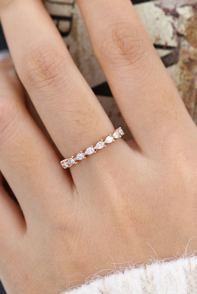 0-63-ct-pear-shaped-moissanite-half-eternity-wedding-band