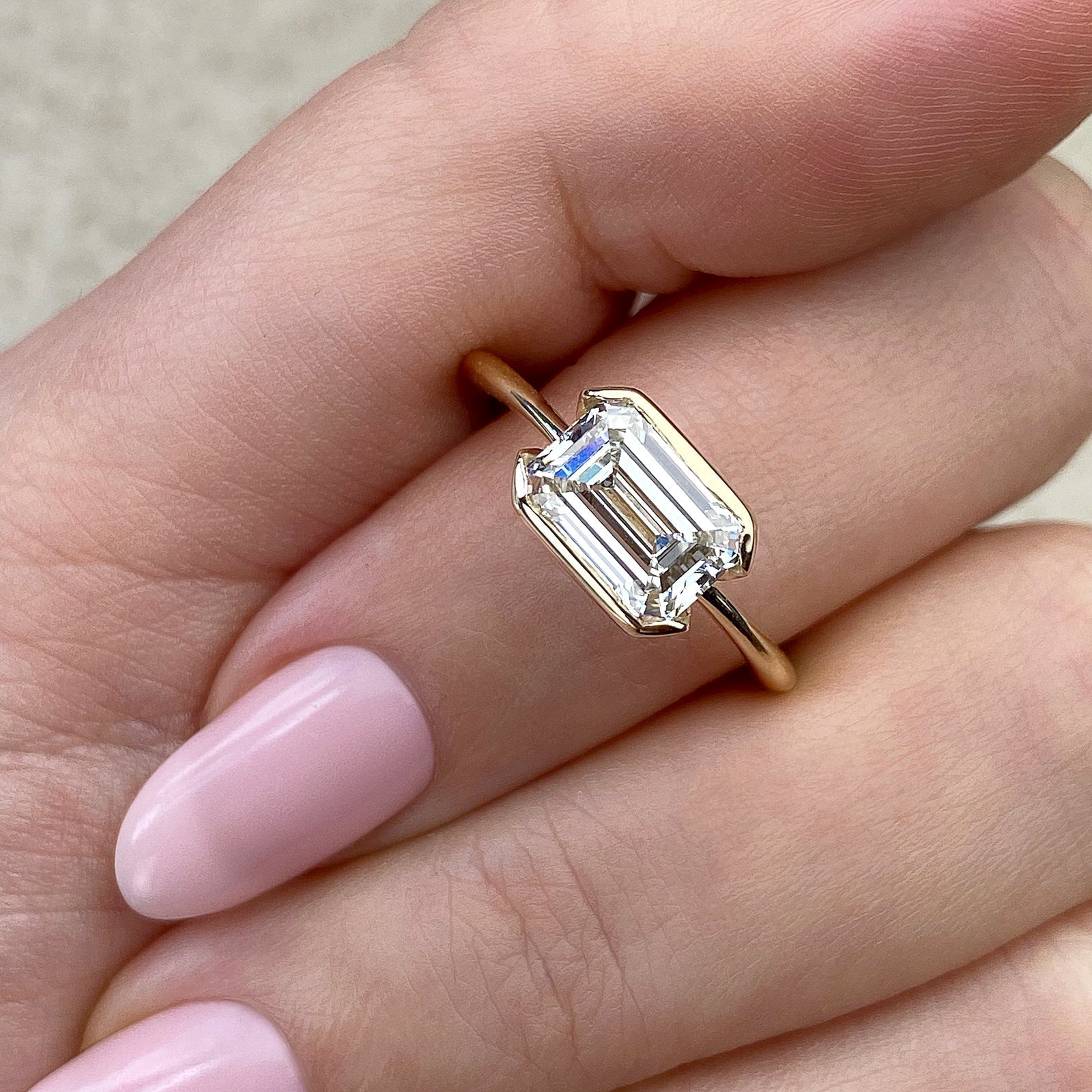 East West Moissanite Engagement Ring