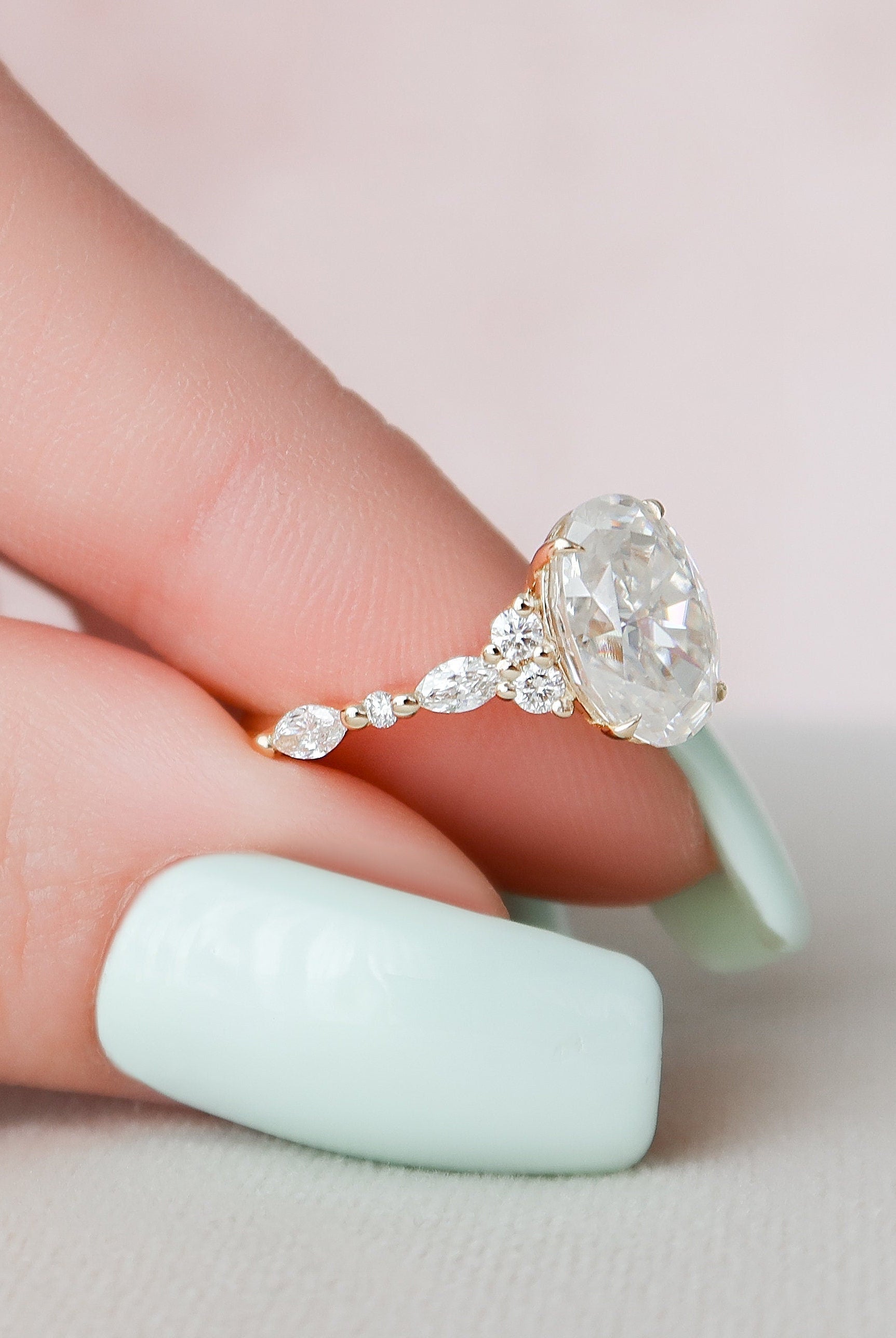 Oval Cut Moissanite Ring with Cluster Setting
