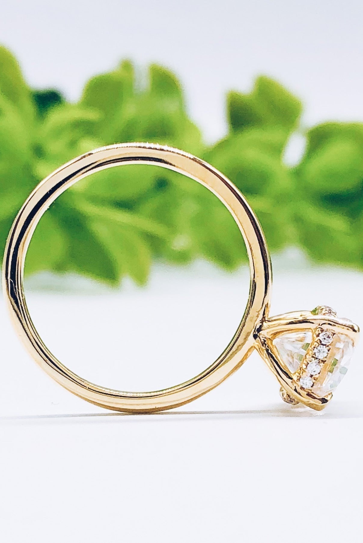 oval-solitaire-hidden-halo-moissanite-engagement-ring