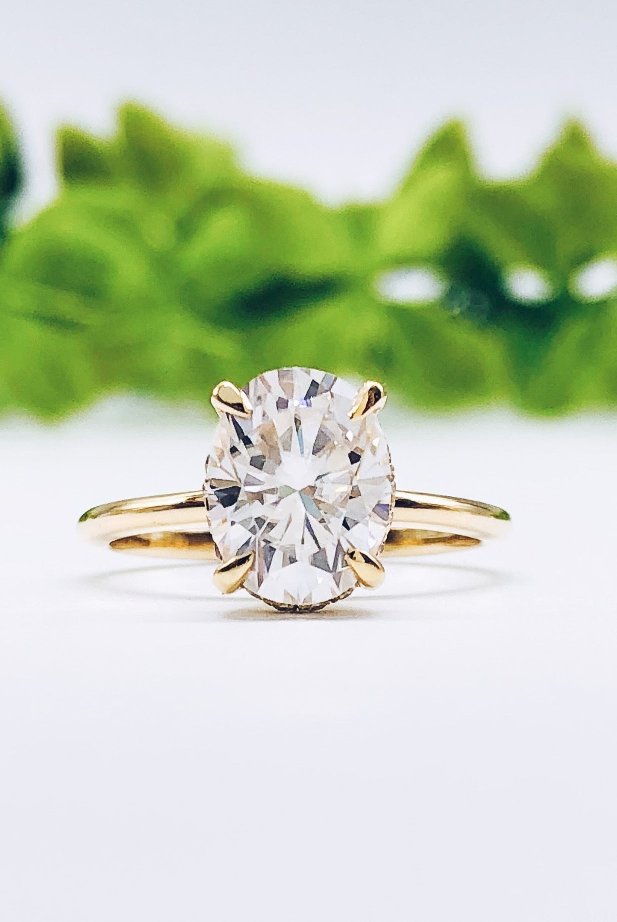 oval-solitaire-hidden-halo-moissanite-engagement-ring
