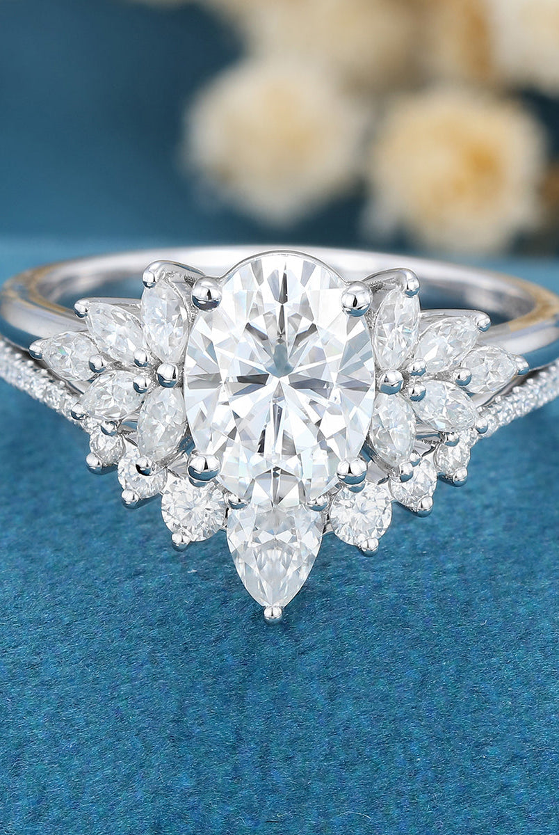 oval-shaped-moissanite-cluster-bridal-set
