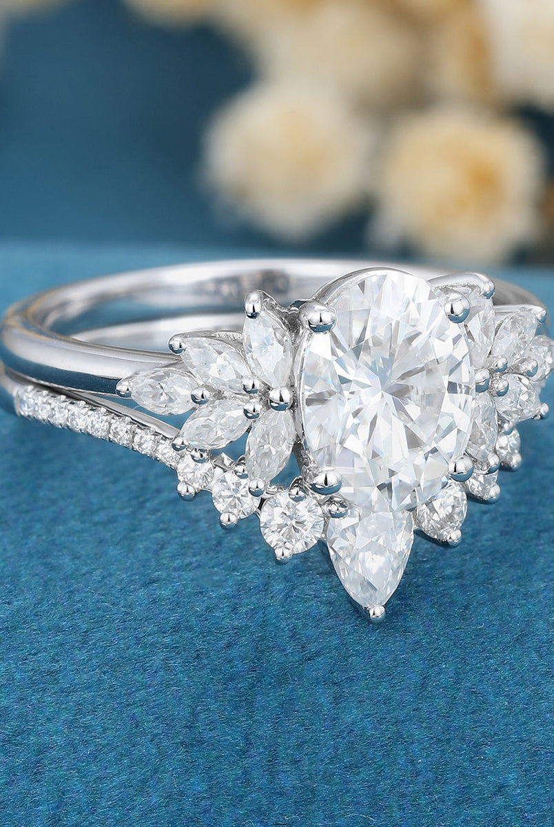 oval-shaped-moissanite-cluster-bridal-set