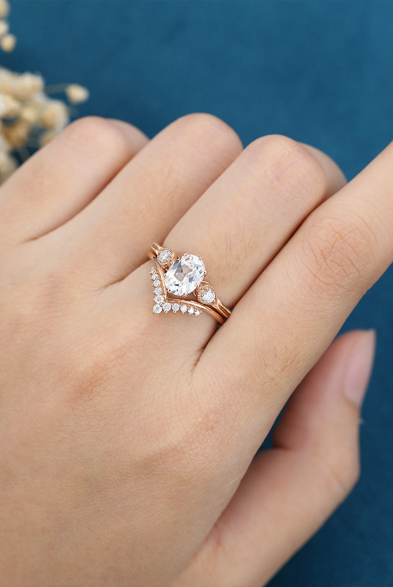 oval-shaped-moissanite-three-stone-bridal-set
