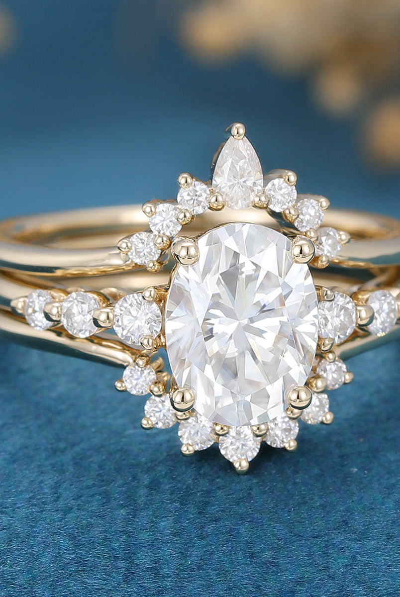 oval-shaped-moissanite-solitaire-pave-bridal-set