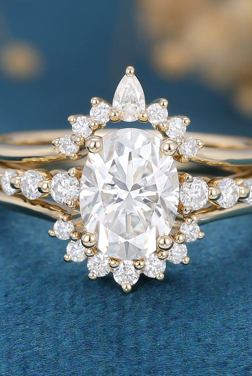 oval-shaped-moissanite-solitaire-pave-bridal-set