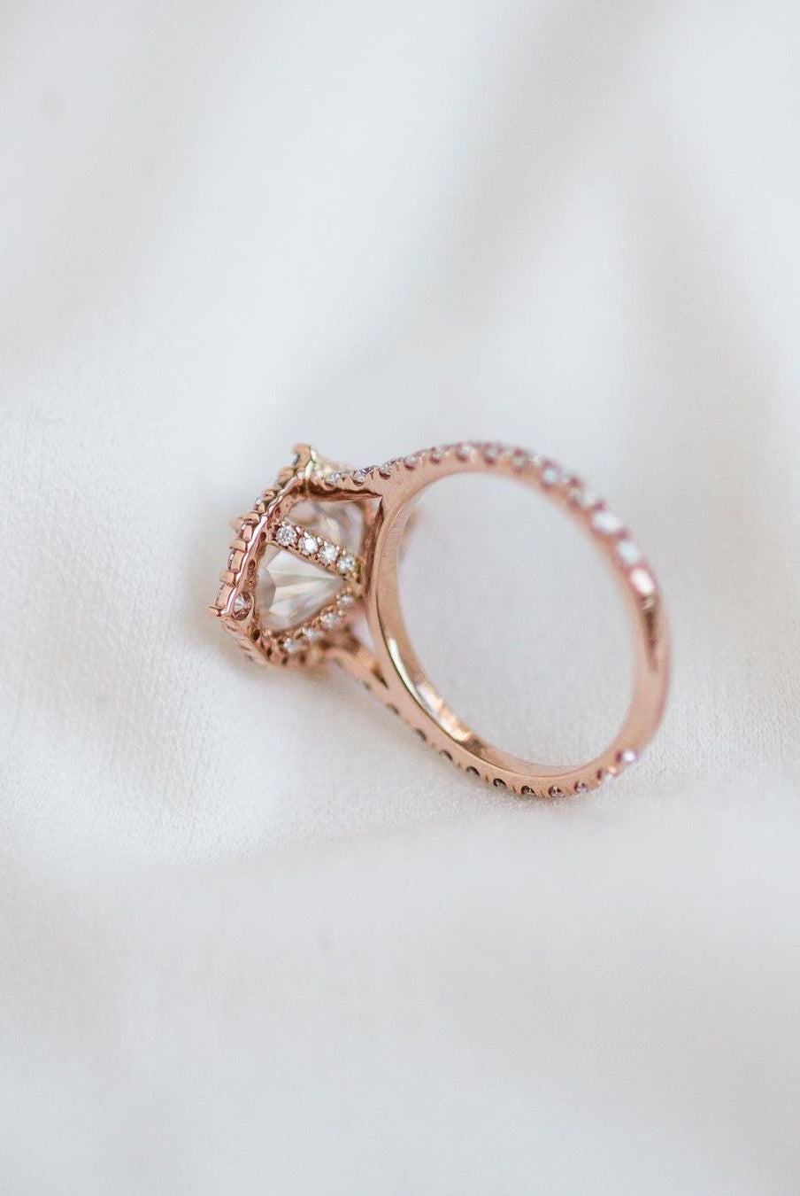 pear-cluster-halo-moissanite-engagement-ring