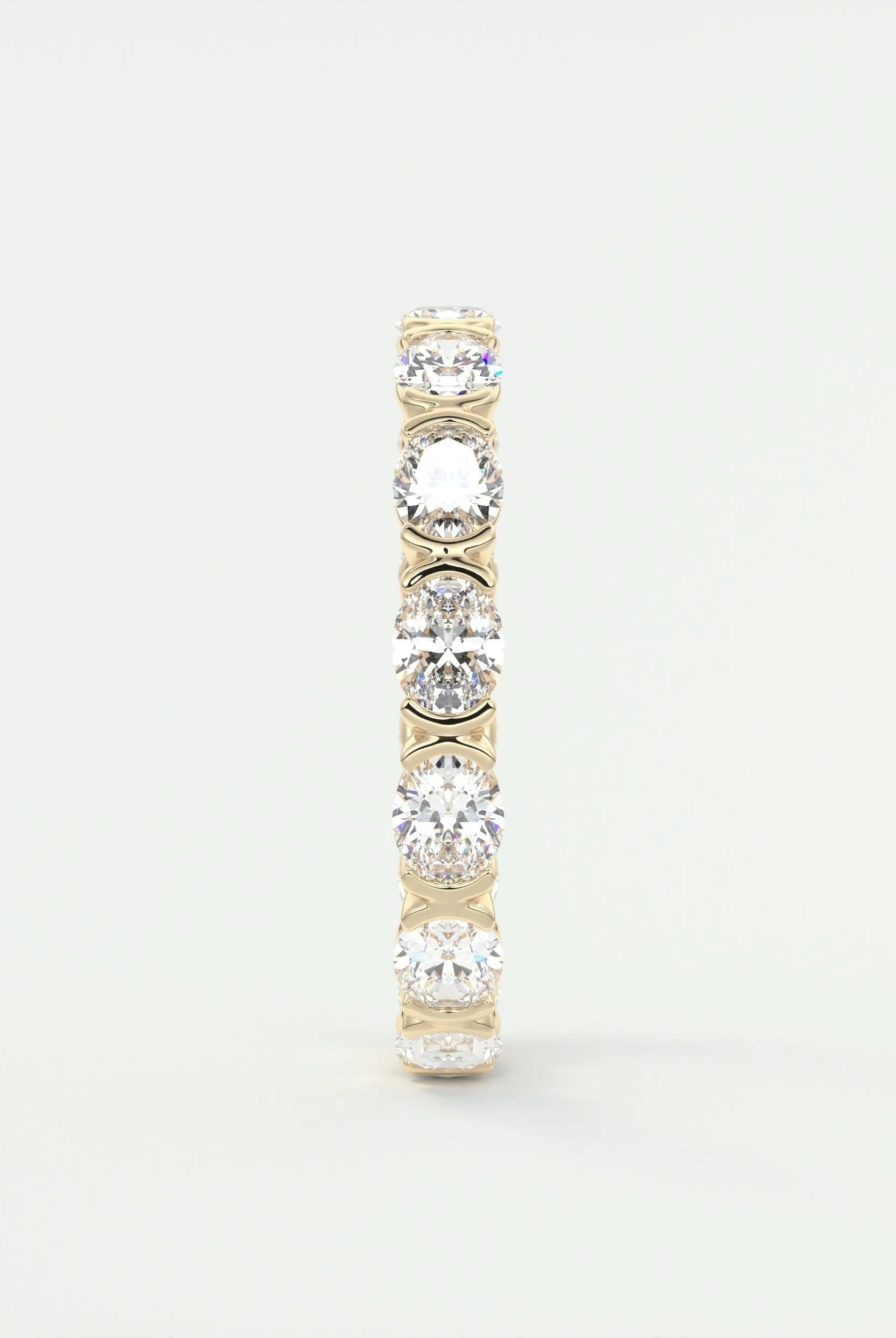 oval-cut-half-bezel-moissanite-bridal-wedding-band