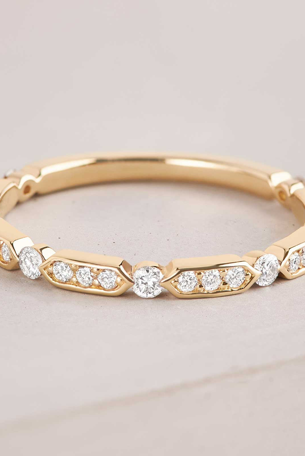 round-shaped-moissanite-minimalist-wedding-band