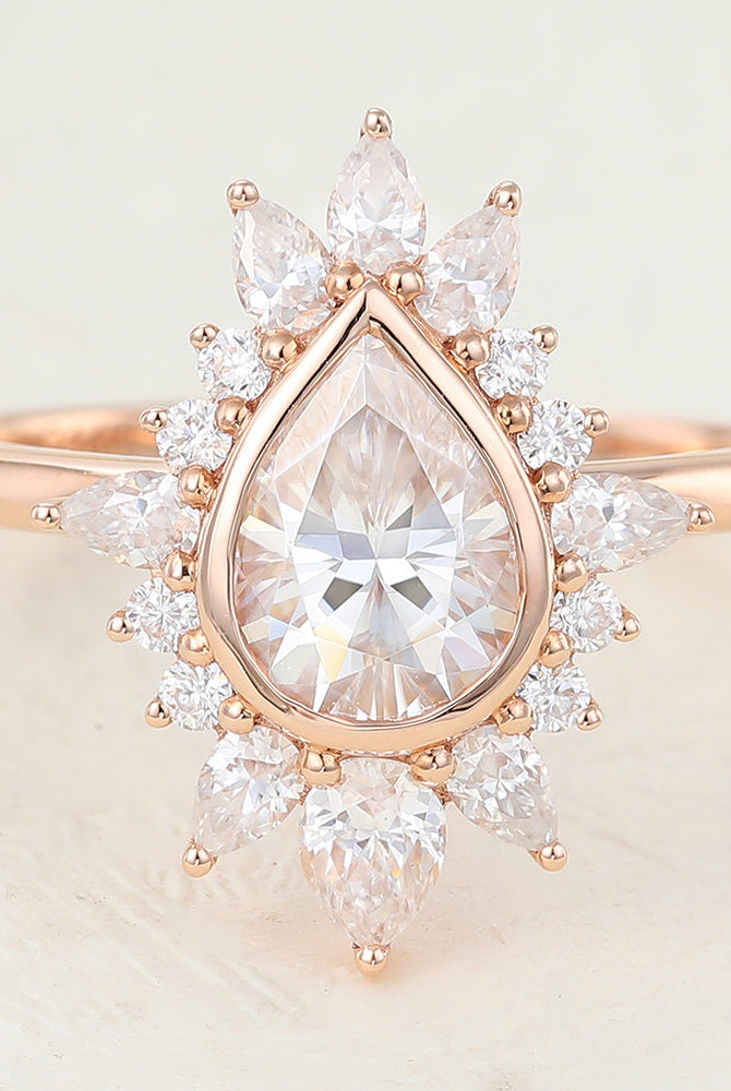 pear-shaped-moissanite-cluster-halo-engagement-ring